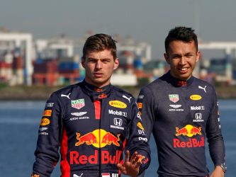 Max Verstappen of the Netherlands and Red Bull Racing and Alexander Albon of Thailand and Red Bull Racing look on during the Aston Martin Red Bull Racing Cooler Runnings event ahead of the F1 Grand Prix of Australia at Station Pier in Melbourne, Wednesday, March 11, 2020. (AAP Image/Scott Barbour) NO ARCHIVING ** STRICTLY EDITORIAL USE ONLY **